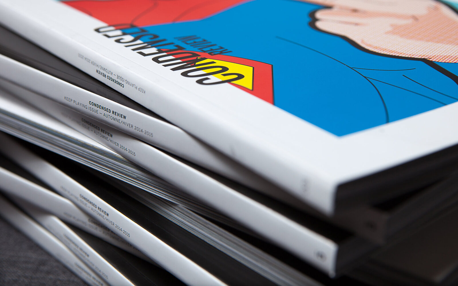 Pile de magazines Condensed Review, numéro automne-hiver 2014-2015